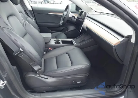 2021 Tesla Model 3 Standard Range Plus Rear-Wheel Drive from USA, damaged, VIN 5YJ3E1EA3MF058374